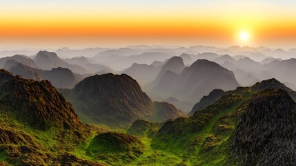 Obraz premium Sunset glow over mountainous hazy landscape