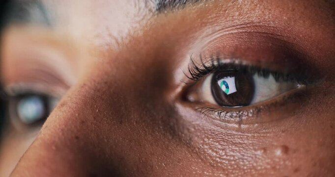 Reading, closeup and eyes of person on computer for research, online proposal and finance statistics. Face, office and worker with reflection of chart for financial review, budget analysis and report