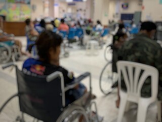 Many patients come to see the doctor and wait for the hospital service .. lens blurred