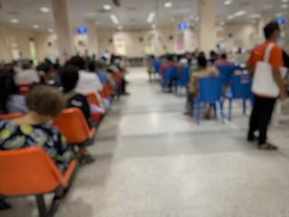 Many patients come to see the doctor and wait for the hospital service .. lens blurred