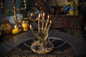 Candle burns on the altar, magic among candles, clean negative energy, wicca concept	 