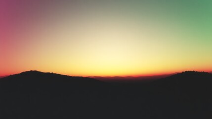 Fototapeta premium Sunset silhouette over mountains horizon view