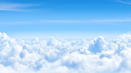 Serene blue sky meets fluffy clouds