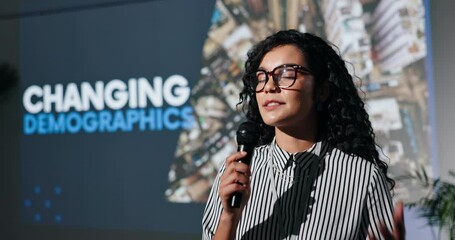 Microphone, presentation and businesswoman at seminar with speech for changing demographics. Conference, screen and female research analyst with workshop for sociology training at convention. - Powered by Adobe