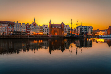 Gdansk with Motlawa river in Poland. Old town colourful house with Stragania Gate