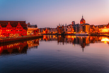 Obraz premium Gdansk with Motlawa river in Poland. Old town colourful house with Polish Baltic Frederic Chopin Philharmonic