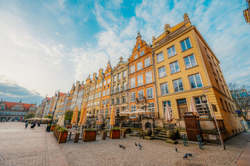 Gdansk with Motlawa river in Poland. Old town colourful house with saint Marys church i main square..