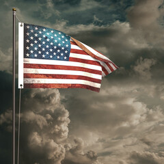 American flag waving under a cloudy sky