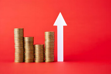 Stacks of coins rising with a white arrow on red
