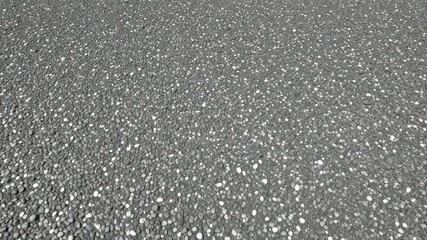 Smooth texture showing a dense aggregation of dark grey pebbles with scattered lighter colored spots