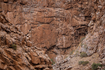 Lines and textures in rocks of mountain cliff