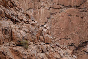 Lines and textures in rocks of mountain cliff