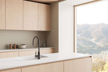 Minimalist modern kitchen interior with light wooden cabinets, white countertop, and large window overlooking forested hills in soft daylight. 3D Rendering