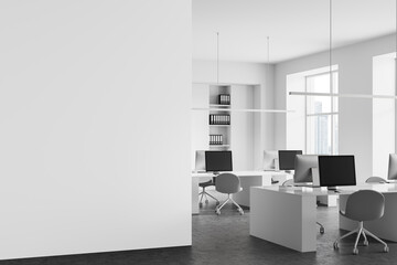 Modern office interior with blank white wall for poster mockup or design presentation in clean, minimal layout with computer desks and chairs.. 3D Rendering