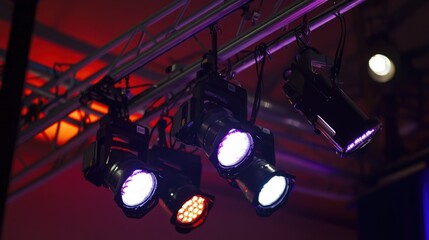 Stage lighting with spotlights being installed on aluminum concert stage