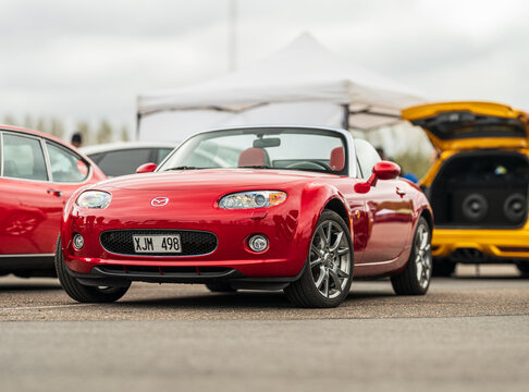 Gothenburg, Sweden - May 11 2025: Red Mazda MX5 Miata convertible on display.