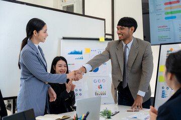 Business Team Handshake in Modern Office