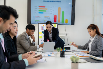 Business Team Meeting with Presentation