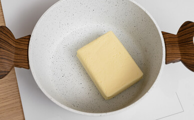 Close-up of melted butter heated in a pot