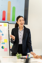 Businesswoman Presenting Data at Meeting