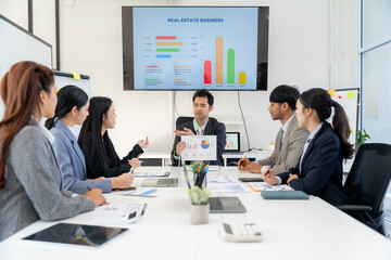 Business Team Meeting with Presentation