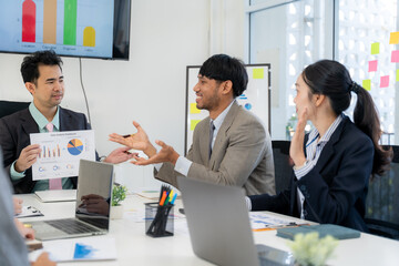 Business Team Discussing Data in Meeting