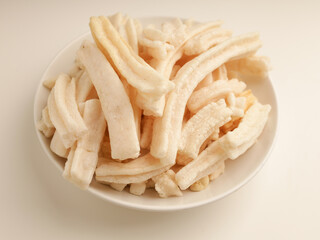 Variety of crackers on white background