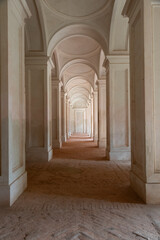 Clean long corridor perspective. Antique building, classic columns, minimalist interior.