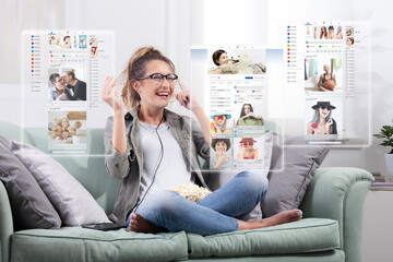 Happy young woman using smartglasses to browse social media content through futuristic virtual screens in augmented reality at home. Modern lifestyle and wearable digital technology concept