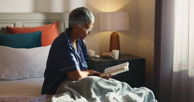 Bedroom, glasses and old woman with reading book to relax, knowledge and literature in retirement. Home, senior person and learning with novel of fiction, romance or hobby for female pensioner in bed