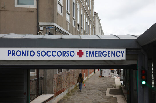 Venezia, VE, Italy - May 6, 2025: Main gate of VENETIAN HOSPITAL with big text and red cross