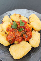 Close-Up of Ulen with Spicy Oncom Sauce, Traditional Sundanese Dish