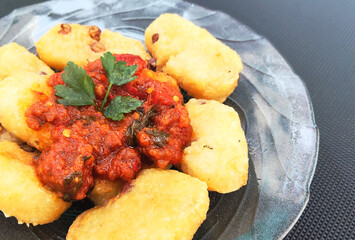 Fermented Soybean Sauce Over Fried Ulen, Traditional Street Food from West Java