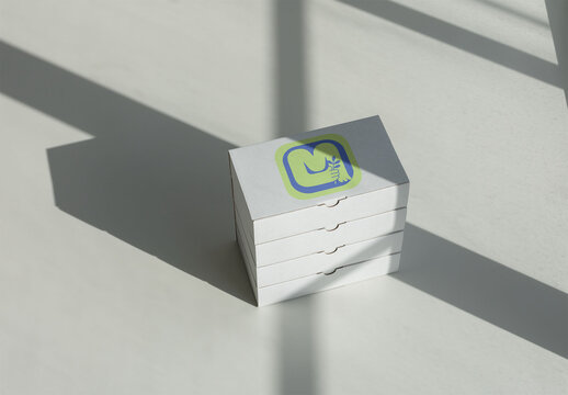 Stacked White Cardboard Boxes