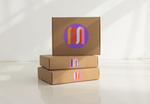 Brown cardboard boxes stacked neatly for delivery purpose. PSD mockup template. front and side