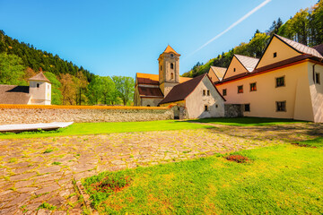 Medieval monastery Cerveny Klastor near Peak Tri Koruny or Trzy Korony in Pieniny National park in Slovakia and Poland. © Zedspider