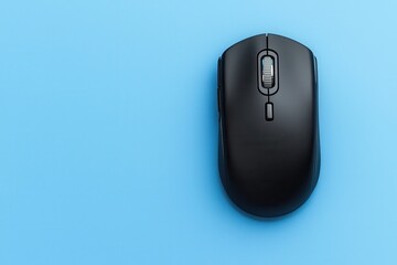 Black computer mouse on a blue background, highlighting modern technology and design.