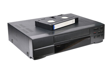 Obraz premium Classic VCR with cassette lying on top isolated on white background.