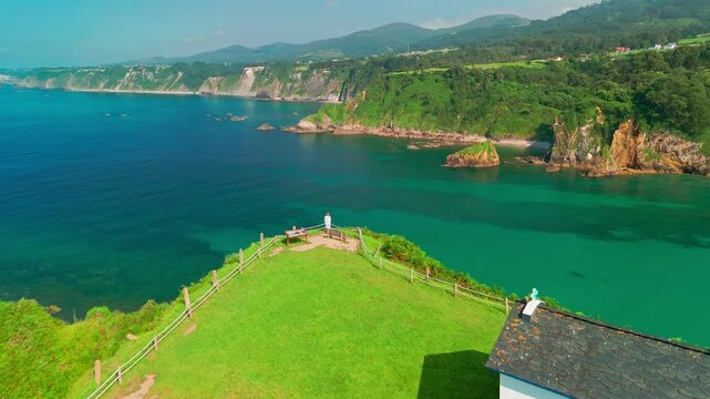 Aerial view of a Ermita de la Regalina on the steep cliffs in Asturias, Spain