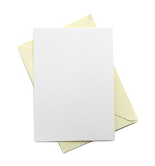 Blank invitation card and envelope isolated on white, top view. Space for design