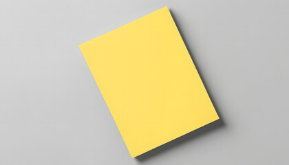 Minimalist yellow paper mockup on gray background — perfect for branding, flyer templates, poster design, or modern stationery presentations in marketing, editorial, and print mockup projects