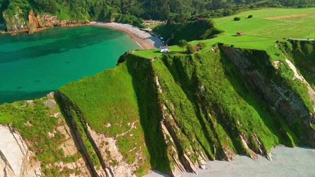 Aerial view of a Ermita de la Regalina on the steep cliffs in Asturias, Spain