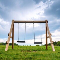 Simple Wooden Playground Swing Set on Grass Under Cloudy Sky for Kids