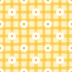 Seamless plaid pattern with daisy flowers,  floral and checkered design for textiles, fashion, scrapbooking, and home décor.