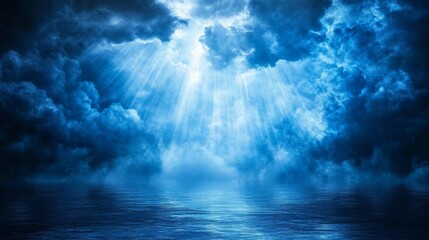 Obraz premium Sunlight bursts through the clouds, casting a dramatic glow on the ocean's surface