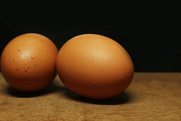 chicken eggs on table isolated , black background freshness eggs