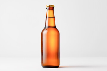 Chilled amber beer bottle with cap on white background
