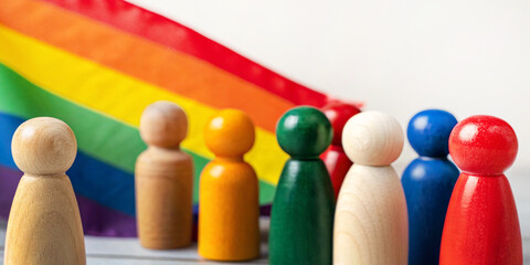 LGBTQ Concept for Group of wooden dolls based on the concept of diversity and unity in equality within human rights