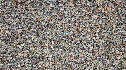 Colorful crumb jasper texture for landscaping or construction with varied stone shades