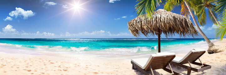 Tropical Palm Beach With Chairs And Straw Umbrella - Maldives Idyllic Island